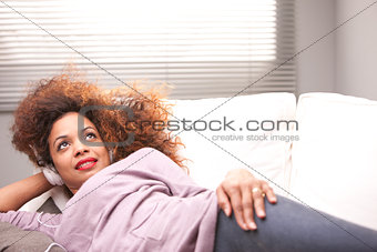 beautiful afroamerican woman on a sofa