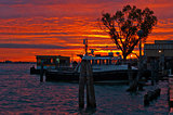 Venice Italy sunset with cruise boat