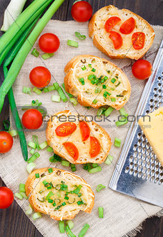 Bruschetta with cherry tomatoes and scallion