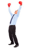businessman raise arms up to win the competition