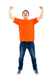 screaming young man raises hands to celebrate