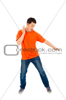 young man imitate a karate expert with fight stance