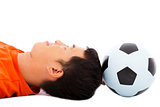 young man lying down and thinking  with soccer