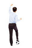 Back view of young businessman make a fist to support