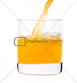 Juice pouring into the glass