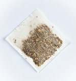 herbal tea bag laying on table
