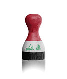 Wooden pawn with a flag painting