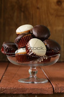 sweet cupcakes with chocolate icing