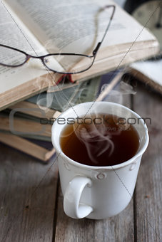 Books, tea and glasses