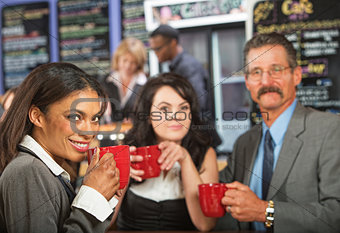 Cheerful Business People in Cafe
