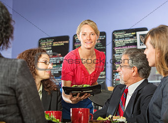 Woman Serving Lunch