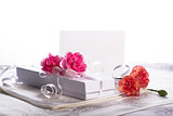 White gift box with flowers