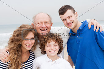 Happy smiling family on beach vacation
