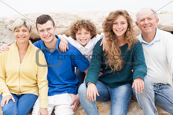 Family having fun on beach holiday