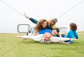 Happy family playing at park