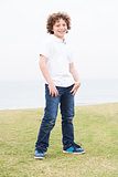 Young boy posing with hand in pocket