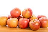 Bunch of Apples on Wood Table with White Background