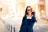 Young Woman with Glasses Out in the City