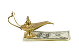 Bundle of dollars and magic lamp of Aladdin