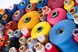 spools of thread of different size, texture and colour