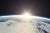 Earth With Sunrise In Space