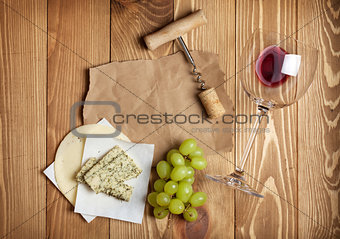 Red wine, cheese and grape