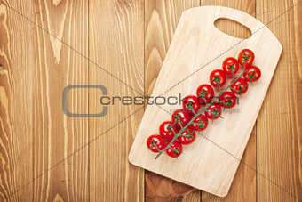 Cherry tomatoes on cutting board