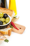 Italian food appetizer of olives, bread and spices