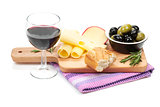 Red wine with cheese, bread, olives and spices