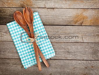 Vintage kitchen utensils over wooden table