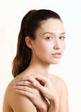 Beautiful young adult woman with clean fresh skin. Wellness