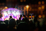 Photographing with smartphone during a public concert