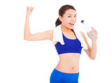 asian woman drinking water and  muscular pose