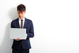 asian business man with laptop