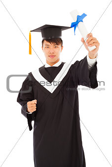 happy graduating student holding diploma