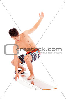 young  surfer make a  surfing pose