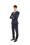 Confident businessman standing and  crossed arms