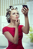 makeup girl with hair rollers 