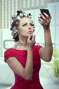 makeup girl with hair rollers 