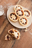 Eating tasty home baked Christmas mince pies