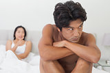 Couple not talking after argument in bed