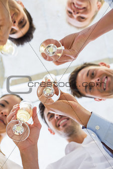 Casual business team toasting with champagne