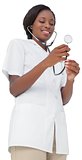 Young nurse listening with stethoscope