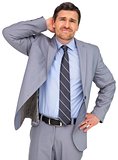 Thinking businessman in grey suit