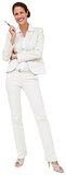 Thinking businesswoman in white suit