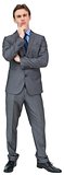 Thinking young businessman in grey suit