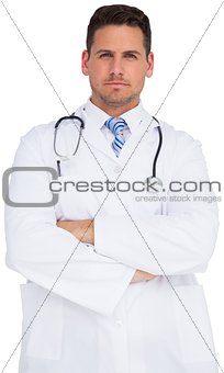 Handsome doctor with arms crossed