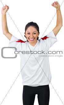 Football fan in white cheering