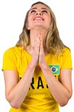 Nervous football fan in brasil tshirt