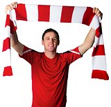 Football fan in red holding scarf